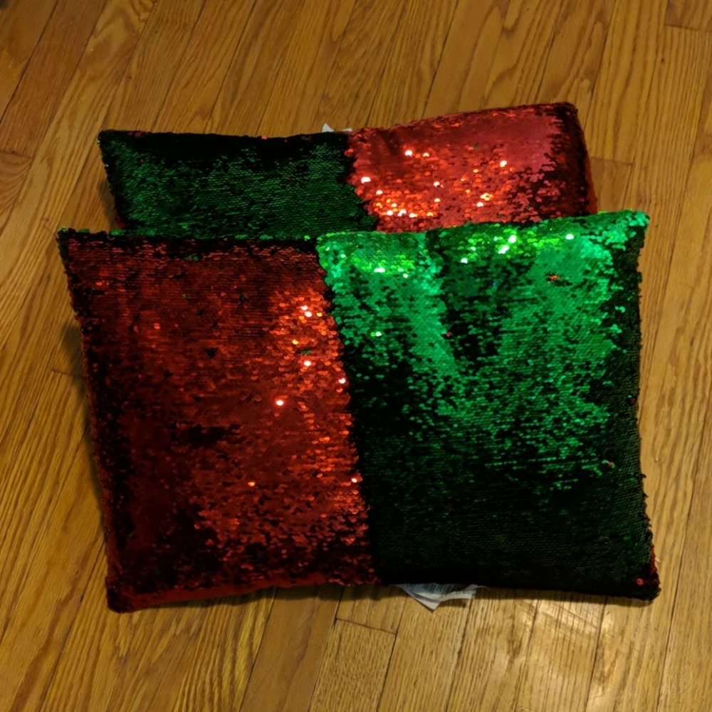 2 red and green flippy sequin pillows